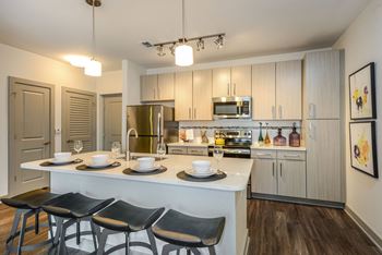 Chef-Style Kitchens with Quartz or Granite Countertops at Aurora Luxury Apartments in Downtown Tampa FL